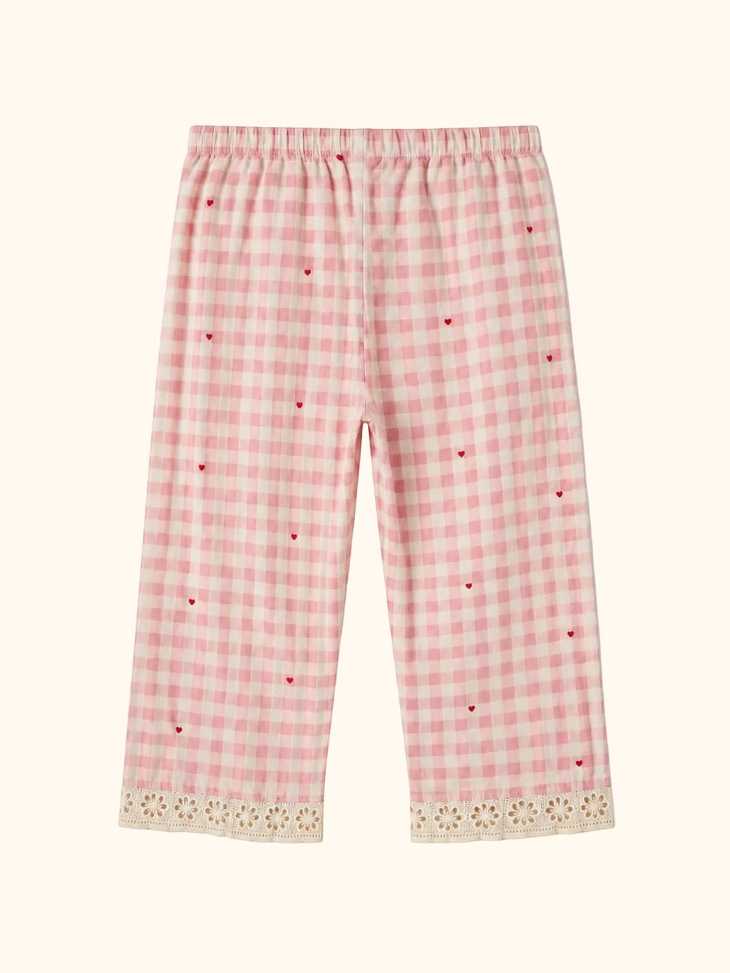 Cocolooms pink and white gingham trousers with tiny red heart embroidery and ivory eyelet lace trim on the cuffs.