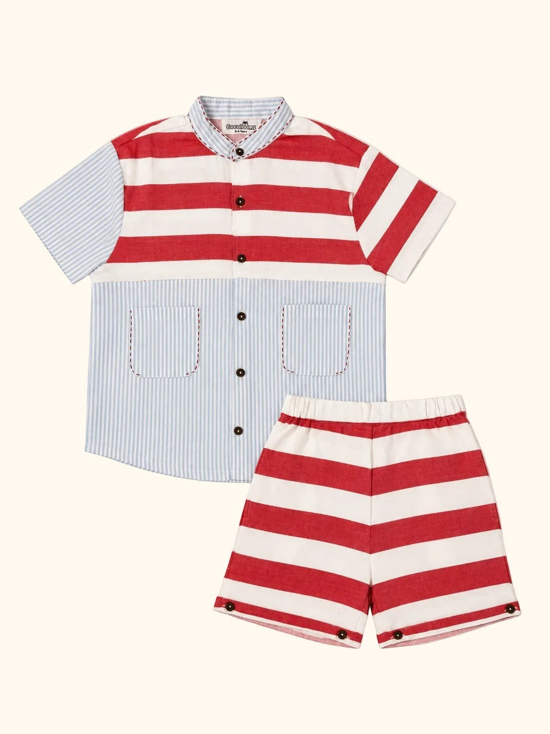 Cocolooms two-piece summer set with red and cream horizontal stripes and light blue pinstriped patchwork shirt.